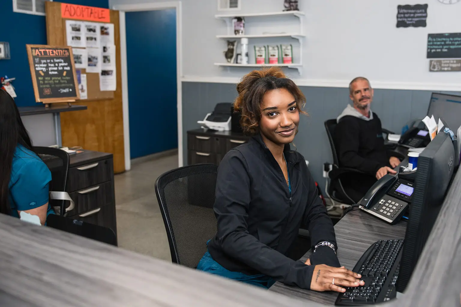 Friendly staff at Beltsville Veterinary Hospital front desk.